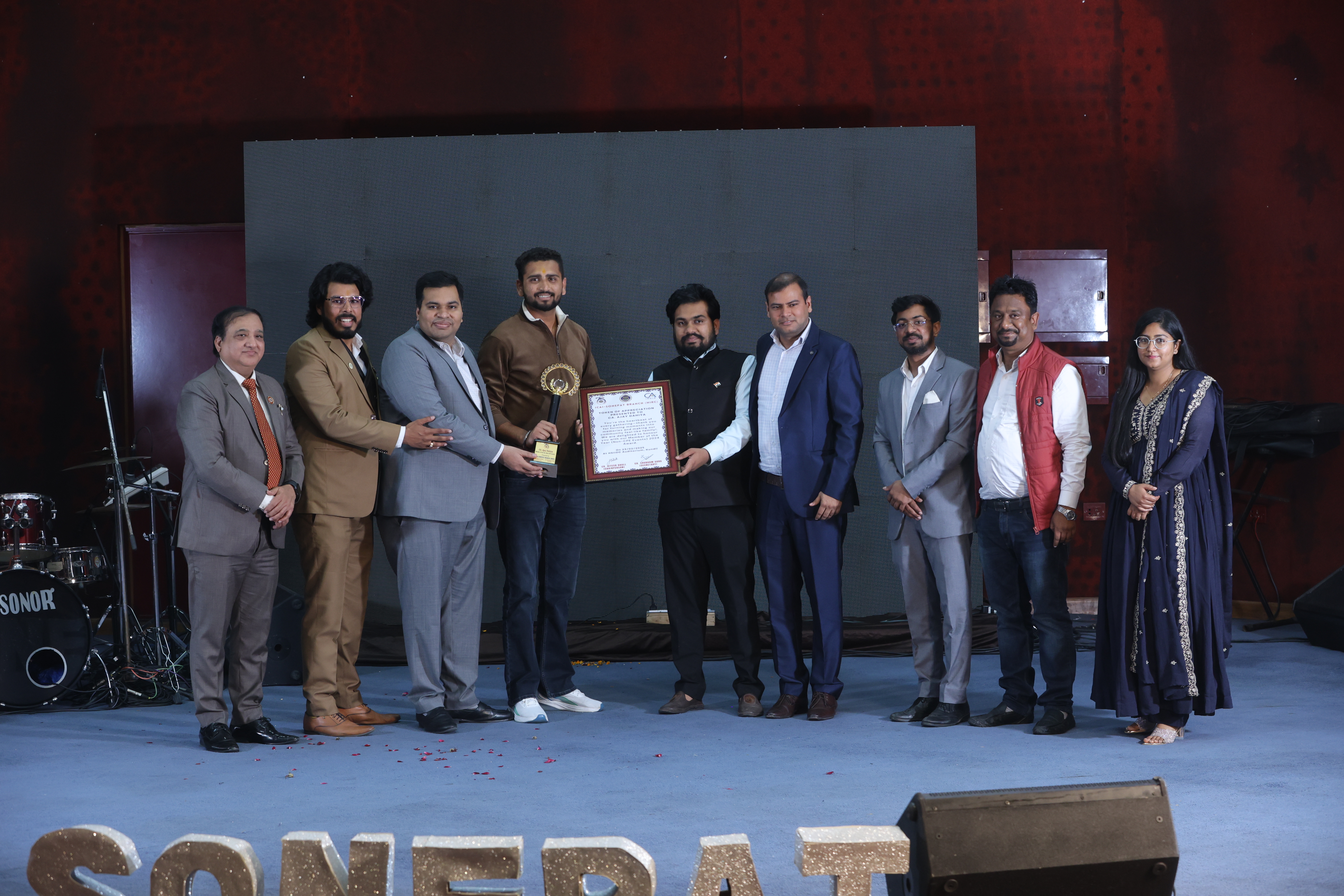 CA Ajay Dahiya getting Member (Male) of The Year Award by Sonepat Branch